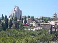 Jérusalem extra-muros. Le moulin à vent de Moïse Montefiore à droite, la tour du YMCA  sur le côté à droite une partie de l'hôtel Kind David.